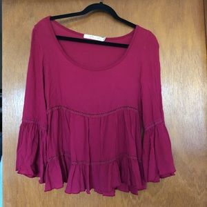Red long bell sleeve top